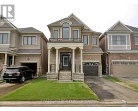 A house with a car parked in front of it.