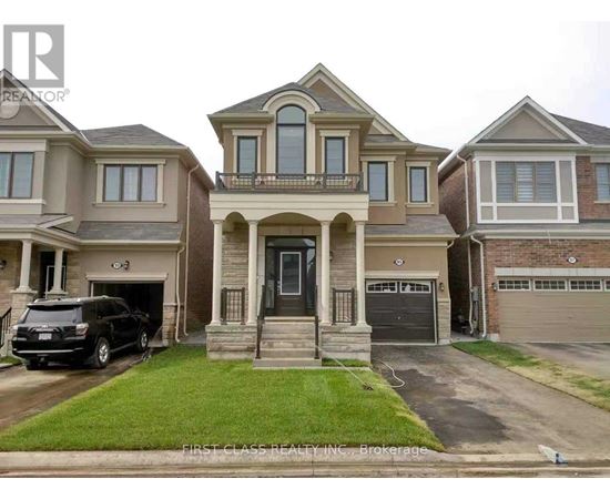 A house with a car parked in front of it.