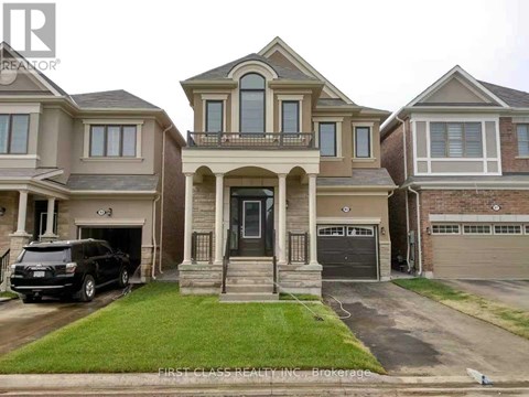 A house with a car parked in front of it.