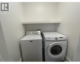 A washer and dryer in a laundry room.