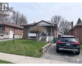 A car is parked in front of a house with a sign that says "REAL ESTATE HOMEWARD BROKERAGE".