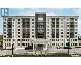 A large building with the words "Wellness Suites" on the front.