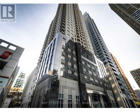 A tall building with the words Bay Street Group Inc. Brokerage on the front.