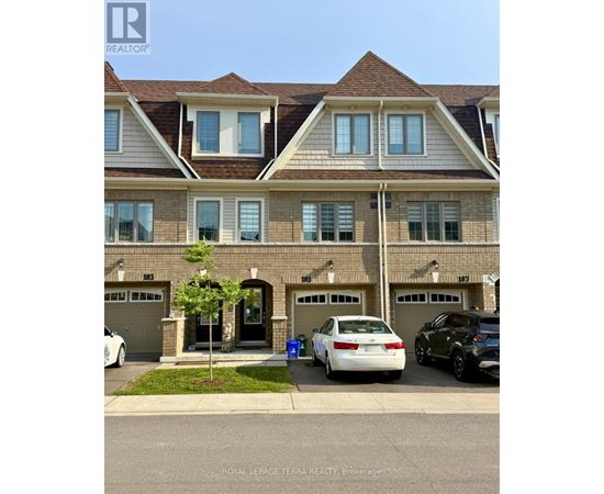 A white car is parked in front of a house with a Royal LePage logo on the bottom left.