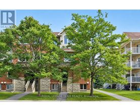 A building with a tree in front of it.