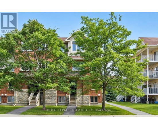 A building with a tree in front of it.