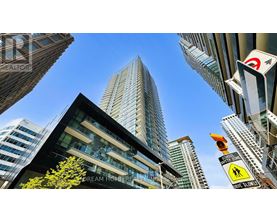 A tall building with the words "Dream Home Realty" on the side.