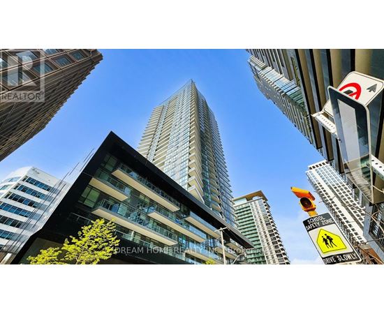 A tall building with the words "Dream Home Realty" on the side.