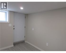 A room with a door and a window.