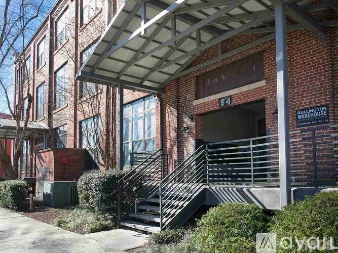 A building with a sign that says "Bullington Warehouse" on it.