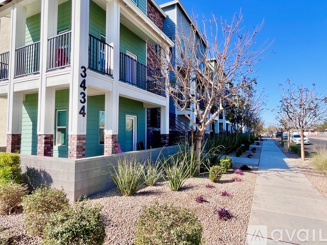 Apartment building with balconies and doors numbered 3434.