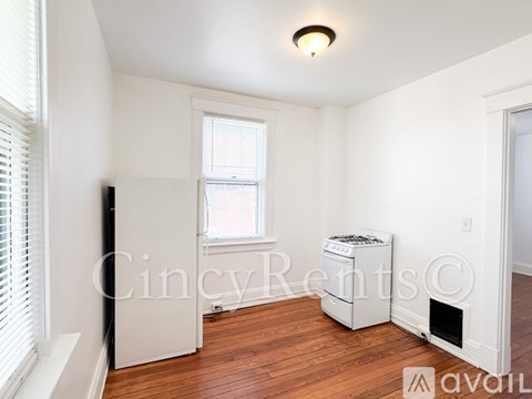 A room with a washer and dryer in it.