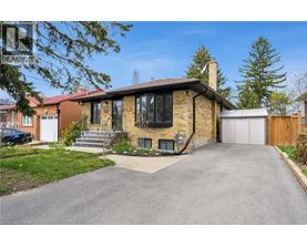 A house with a driveway in front of it.