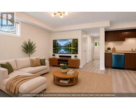 A living room with a couch, a coffee table, and a television.