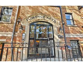 The entrance to a building named Florence Apts.