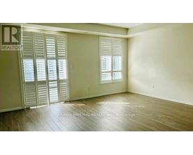 A room with a sliding door and a window.