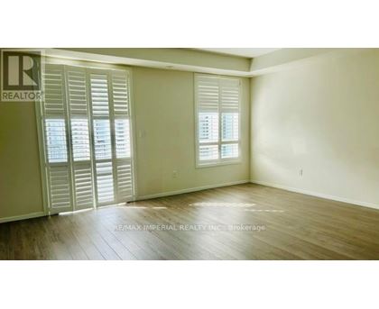 A room with a sliding door and a window.
