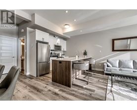 A modern kitchen with a dining table and chairs.