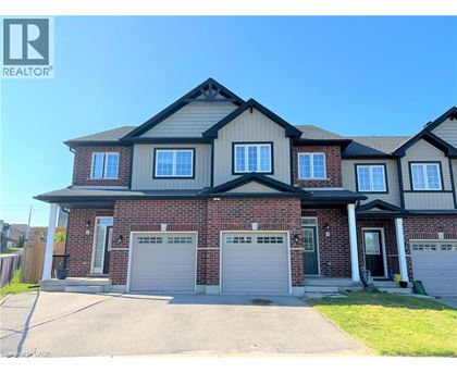 A large house with a garage is for sale.