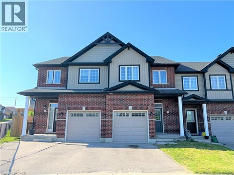 A large house with a garage is for sale.