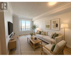 A living room with a couch, coffee table, and television.