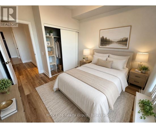 A bedroom with a large bed, a painting on the wall, and a potted plant on the nightstand.