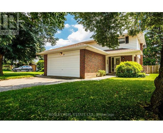 A house with a garage is for sale.