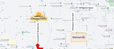 A map shows the location of Walmart in relation to other landmarks such as Osage Hills and the airport.