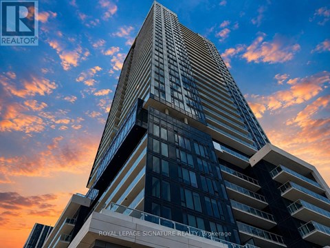 A tall building with the words "Royal LePage Signature Realty Brokerage" on it.