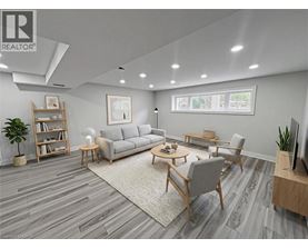 A living room with a grey sofa, a wooden coffee table, and a television.