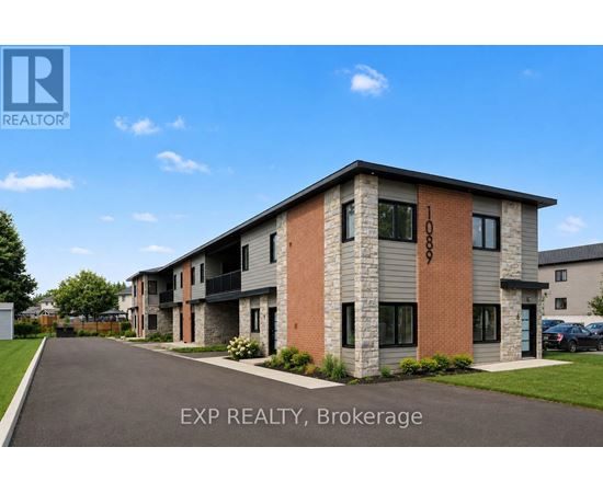 A building with the text EXP REALTY, Brokerage on it.