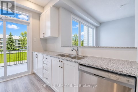 A kitchen with a sink and cabinets.