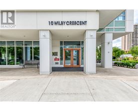 The front of a realtor office with the name 10 Wilby Crescent on the top.