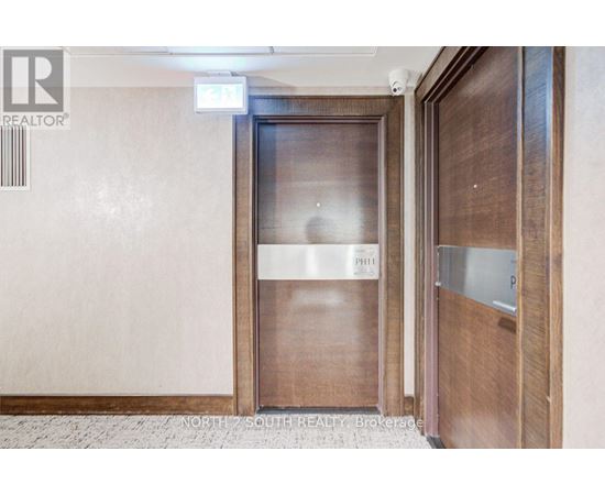 A brokerage office with a door that says "P" on it.