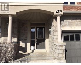 A house with the number 150 on the front.