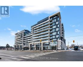 A modern multi-story building with a glass facade is the main focus of the image.