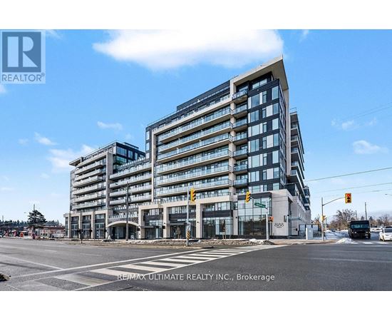 A modern multi-story building with a glass facade is the main focus of the image.