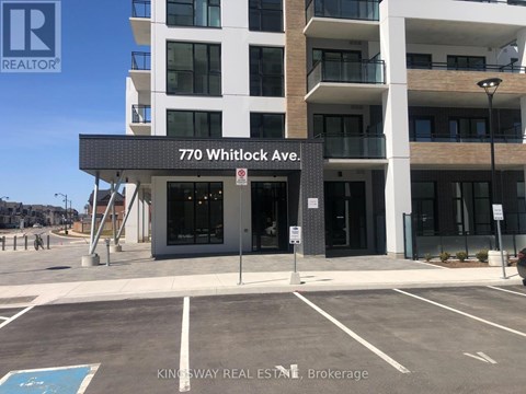 A building with the sign 770 Whitlock Ave. in front of it.