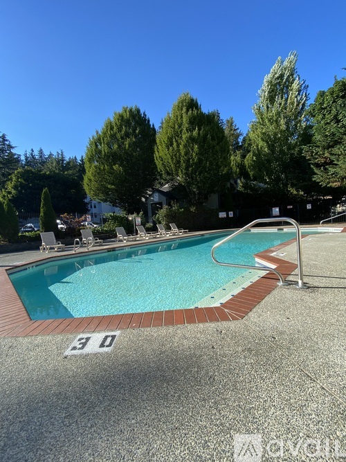 A pool with the number 30 on the ground.