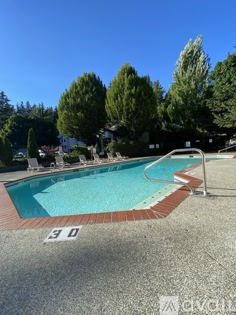A pool with the number 30 on the ground.