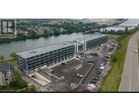 A large building with a parking lot in front of it.