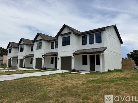 A row of houses with the first one being available for purchase.