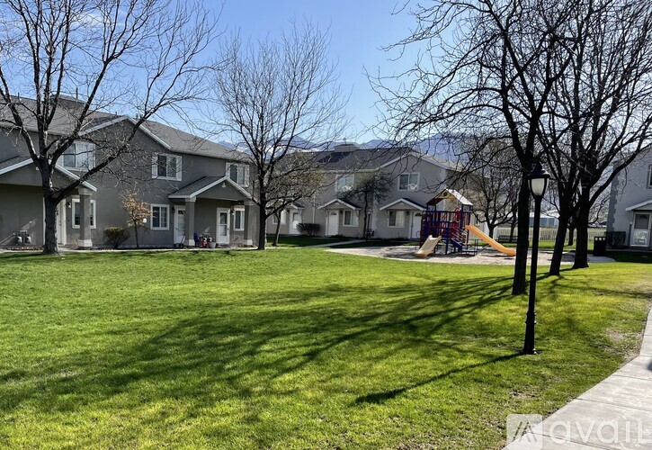 A residential area with houses and a playground.