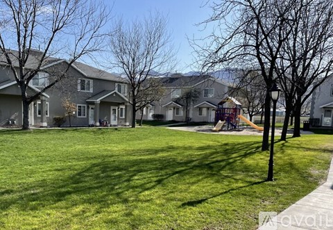 A residential area with houses and a playground.