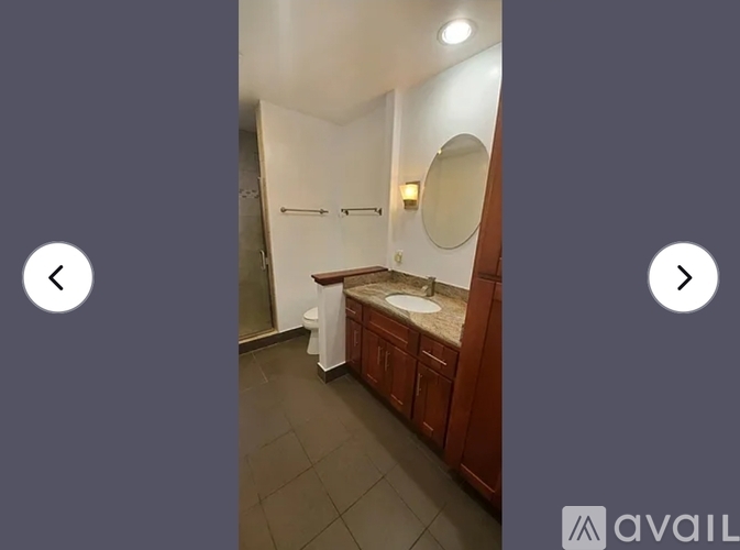 A bathroom with a sink and mirror.