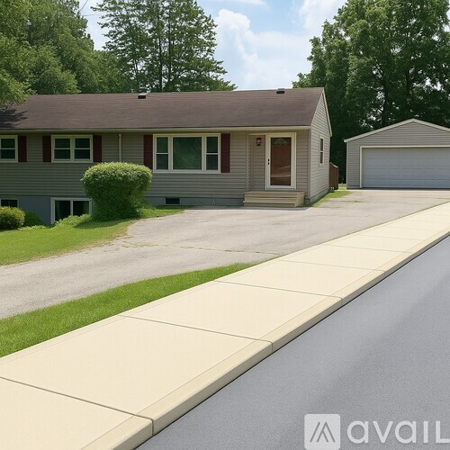 A house with a garage is available for sale.