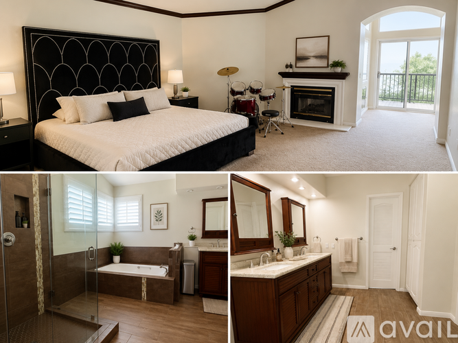 A bedroom with a large bed, a bathroom with a walk-in shower, and a living room with a fireplace.