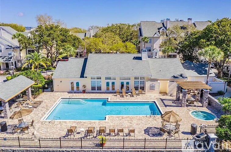 A large house with a pool in the backyard.