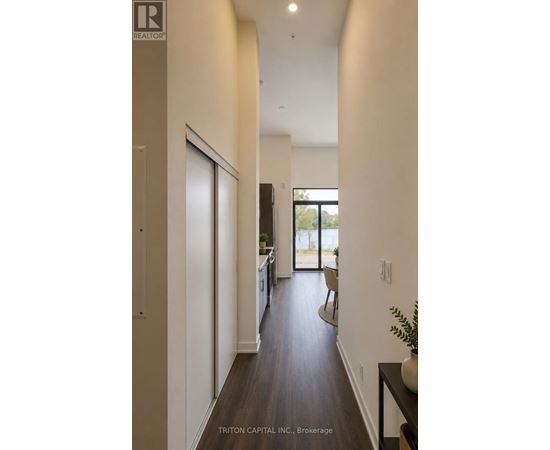 A brokerage company is advertising a property in Triton Capital, Inc.