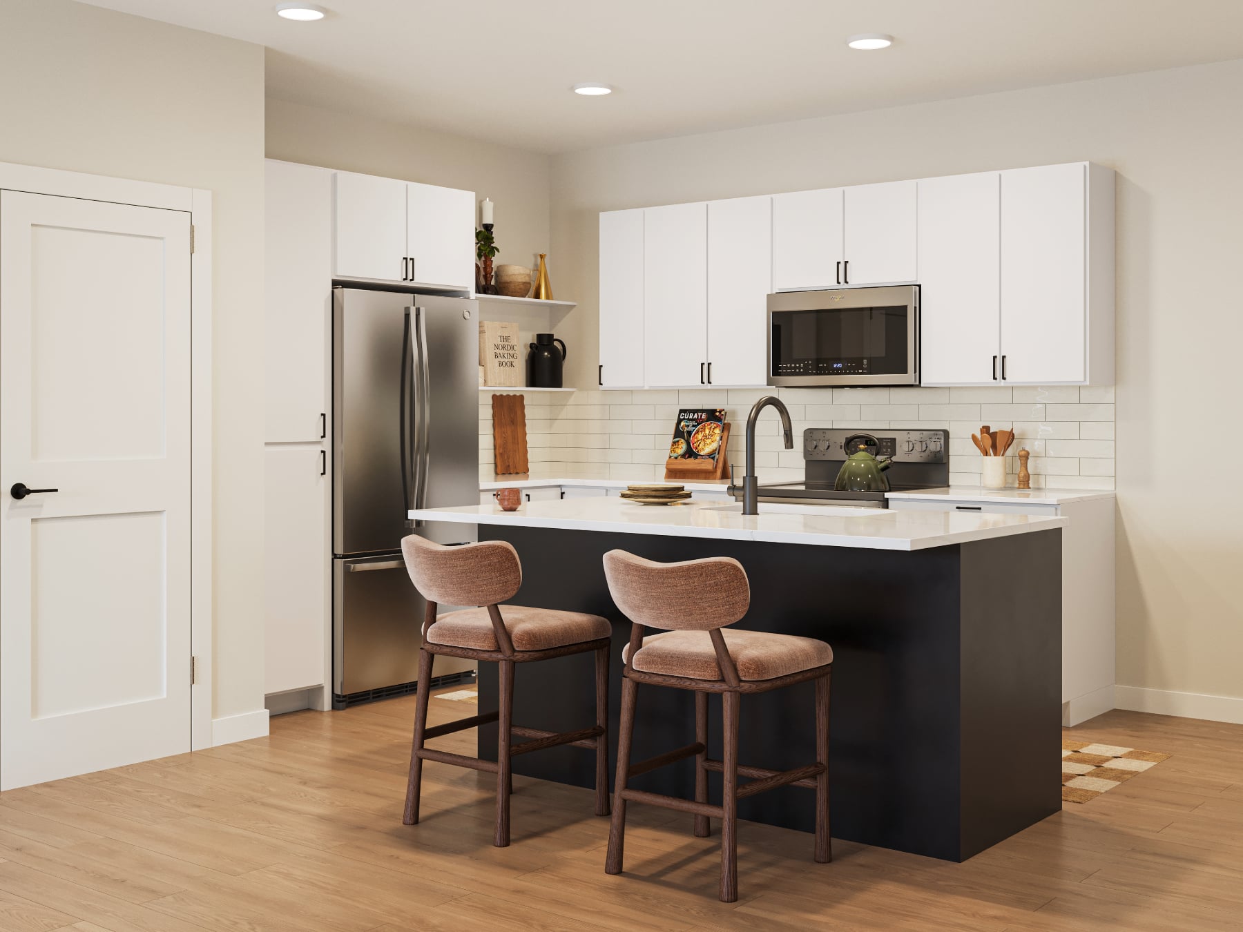 A kitchen with a black countertop and white cabinets.